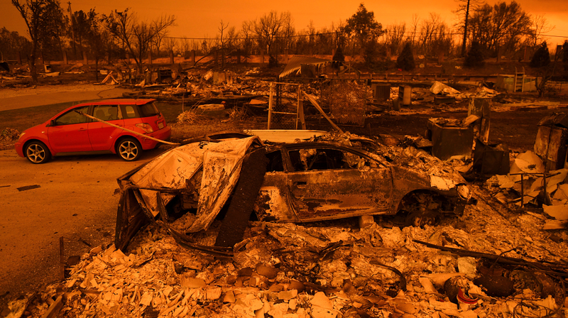 Cars and homes burned on the outskirts of Redding, California on July 27th.